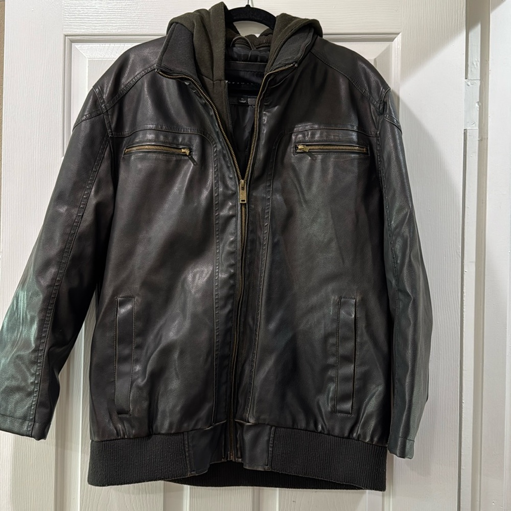 Men’s Sean John XL faux leather jacket with hood. Good condition. Heavy weight.